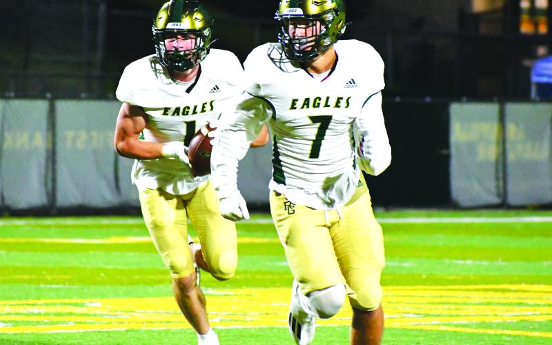 Luke Morey/The Clayton Tribune. Senior Nickolas Roy (7) and junior Trey Horne were two of 10 Rabun Gap players to be named to the All-Conference team.