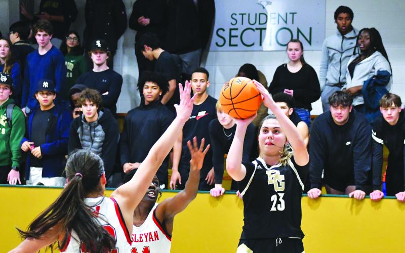 Luke Morey/The Clayton Tribune. Senior Tuana Coskun hits a jumper in the home opener against Wesleyan Christian Academy on Friday night. Coskun ended with 18 points and seven rebounds as she’s been leading the team with 15 points per game. On Saturday against Asheville, Coskun scored 13 in only the Lady Eagles’ second loss of the season.