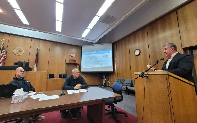 Megan Broome/The Clayton Tribune. County Attorney Allyn Stockton highlights updates and changes in the proposed Short-Term Rental Ordinance as he addresses commissioners at Tuesday’s meeting. Also pictured are commissioners Scott Crane and Tom Garrison actively listening.