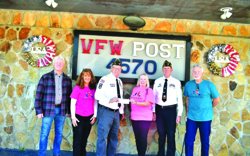 Megan Broome/The Clayton Tribune. Pictured are Patrick Henry, treasurer of Richard’s Kids; Candie Moore, board member for Richard’s Kids; Veteran Gary Cantwell, VFW Post 4570; Carolyn Dillard, president of Richard’s Kids; Veteran Jon Jones, VFW Post 4570; and Mike Moraign, board member for Richard’s Kids.