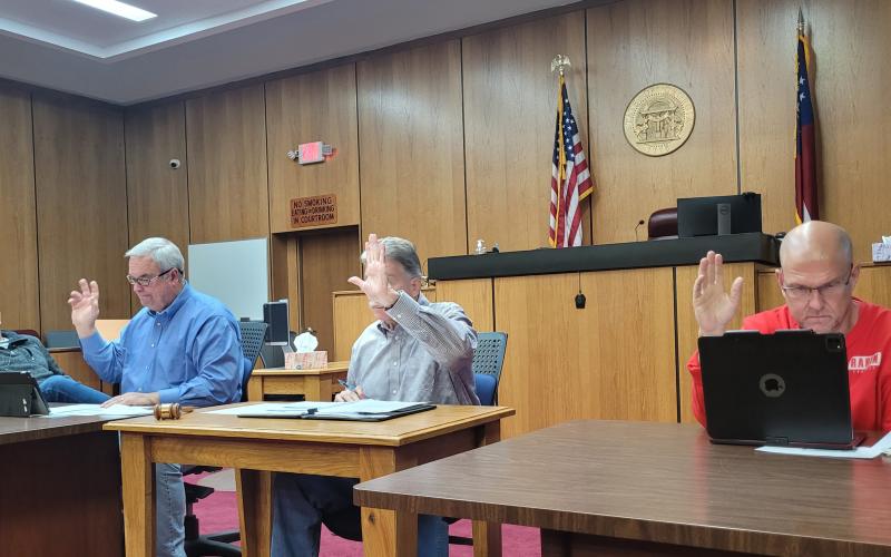 Megan Broome/The Clayton Tribune. Rabun County commissioners vote Tuesday to approve the first reading of an ordinance to allow campers and motorhomes on a property during construction.