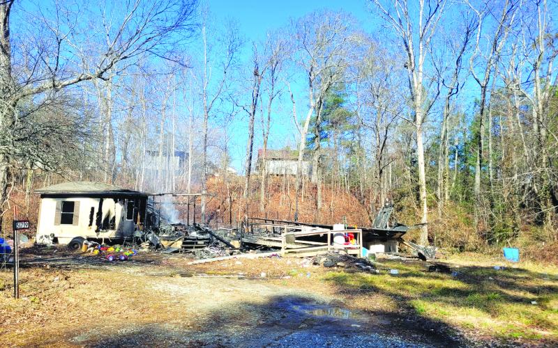 Megan Broome/The Clayton Tribune. The cause of the fire at 579 Connector Road off Camp Creek Road in Wiley remains under investigation by the State Fire Marshal’s Office.