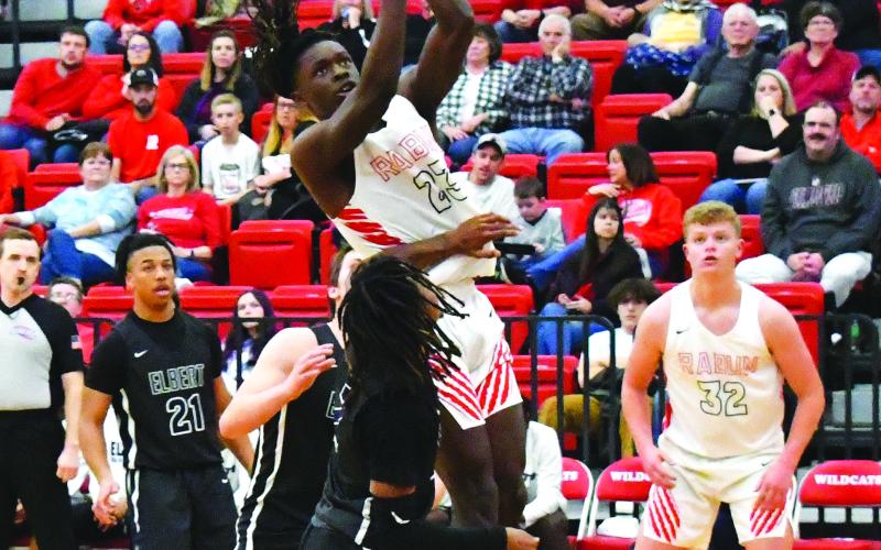 Luke Morey/The Clayton Tribune. RCHS junior Willie Goodwyn goes up for a layup against Elbert County on Jan. 20. Goodwyn posted his fifth double-double of the season as he put up 14 points and 17 rebounds to help the Wildcats to an undefeated week. RCHS took on Tallulah Falls on Jan. 24 before returning home for senior night on Jan. 27, against Commerce.