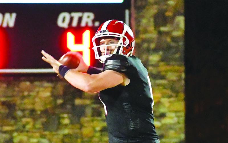 Luke Morey/The Clayton Tribune. Senior Keegan Stover throws a pass againt Commerce on Friday, Oct. 28, 2022. Stover was named the Georgia Elite Classic’s top performer on Dec. 28. Over his senior season, Stover threw for 3,605 yards with 41 touchdowns and only three interceptions as he helped the Wildcats to a 12-1 record as they fell in the GHSA quarterfinals.