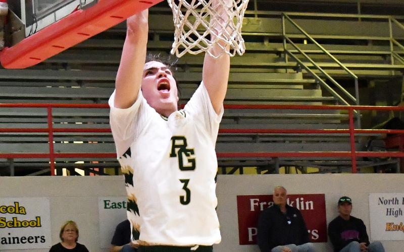 Luke Morey/The Clayton Tribune. Rabun Gap senior Theo Antinori goes up for a dunk late in the fourth quarter against The Skill Factory on Saturday, Jan. 21. Antinori finished with 27 points as he helped the Eagles defeat the third-ranked team in Georgia.