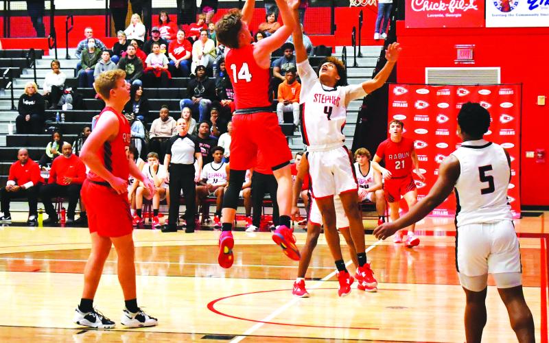 Luke Morey/The Clayton Tribune. Junior Cooper Welch goes up for a basket against Stephens County. Welch and the Wildcats dropped both games over the weekend.