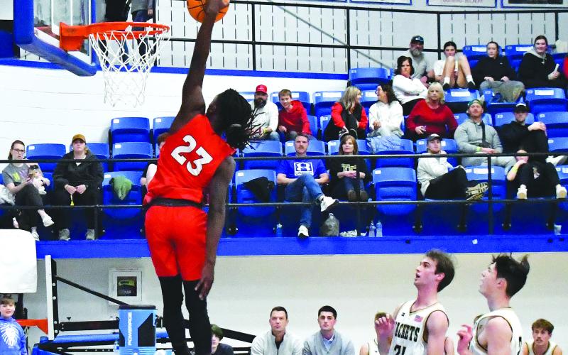 Luke Morey/The Clayton Tribune. Junior Willie Goodwyn goes up for a dunk against Hayesville on Wednesday, Dec. 28. Goodwyn made it to the All-Tournament team after posting 11 points and 17 rebounds in the championship game.