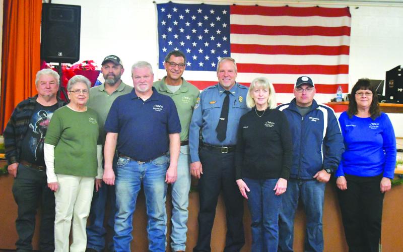 Megan Broome/The Clayton Tribune. Pictured are Jerry Robinson; Mayor Grace Watts; Council Member Eric McCrackin; Council Member Robert Sutton; Council Member Michael Holt; Police Chief Tom Garrison; City Clerk Brenda Cannon; Interim Police Chief Jeremy Welch; and Council Member Brenda Hooper.