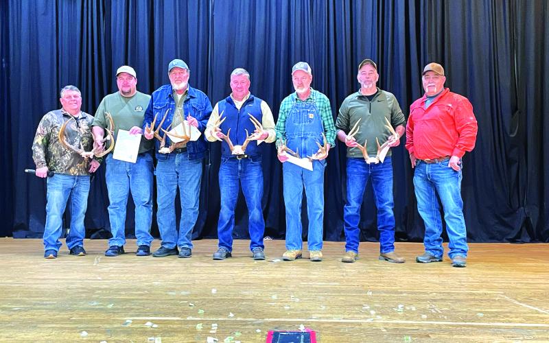 Tony Penrose/The Clayton Tribune. The One for the Wall 2022-2023 Deer Contest included many participants at the Rabun County Civic Center Saturday, Jan. 28. Pictured are organizer Shayne Beck (left); Clifford Williams, adult first place winner; Rodney Kilby, second place; Allyn Stockton, third place; David Justus, fourth place; Tim Henderson, fifth place; and organizer Lee Callenback.