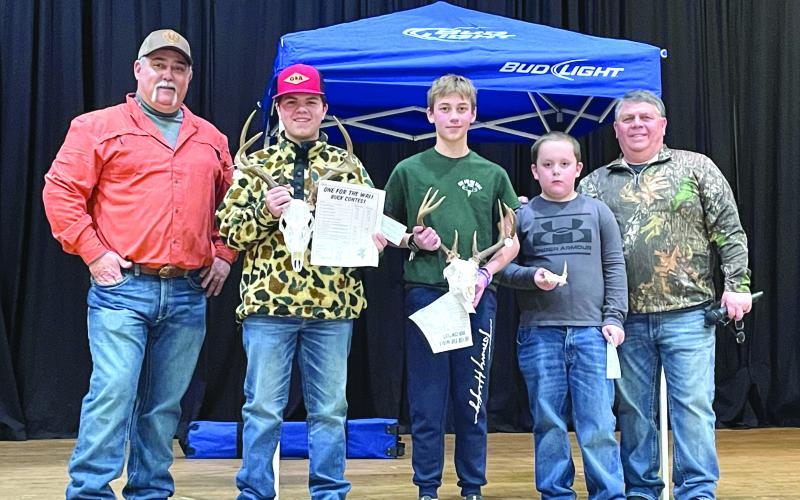 Tony Penrose/The Clayton Tribune. The One for the Wall 2022-2023 Deer Contest included many participants at the Rabun County Civic Center Saturday, Jan. 28. Pictured are Organizer Lee Callenback, left; Layne Holcomb, Youth First Place Winner; Landon Gibson, Second Place; and Jarvis Lambert, Third Place.