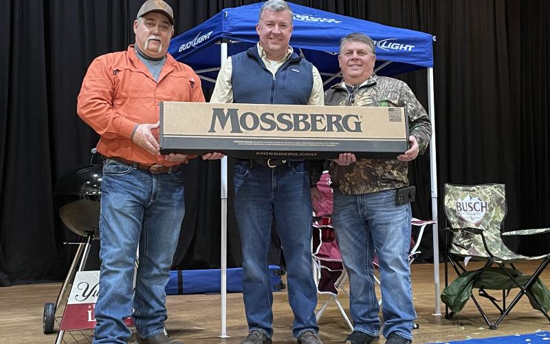 Tony Penrose/The Clayton Tribune. The One for the Wall 2022-2023 Deer Contest included many participants at the Rabun County Civic Center Saturday, Jan. 28. Pictured are Organizer Lee Callenback, left; with Allyn Stockton, Adult Gun Raffle Winner; and Organizer Shayne Beck.