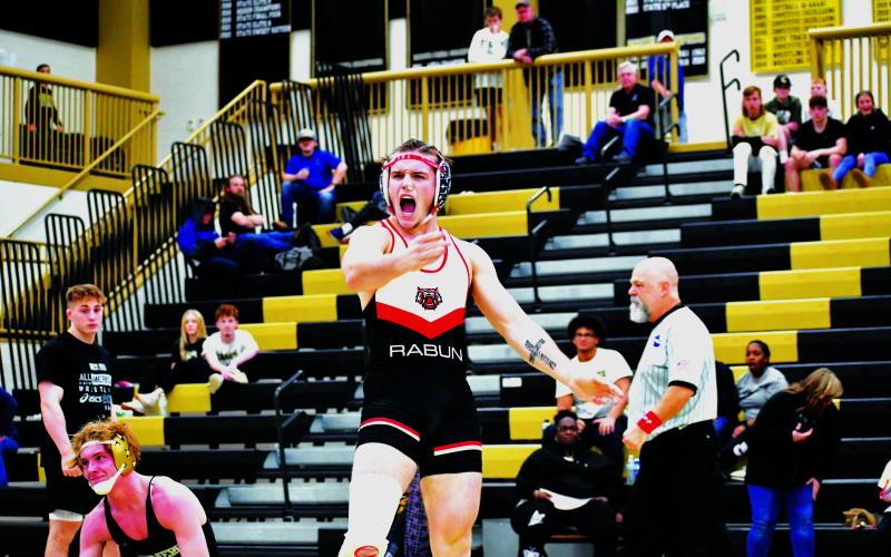 Luke Morey/The Clayton Tribune. Rabun County senior Miles Watts reacts after defeating Brayden Phillips in the first place match at the area tournament at Commerce on Saturday, Feb. 4.  Watts scored the winning points over Phillips with 15 seconds remaining in the final period.