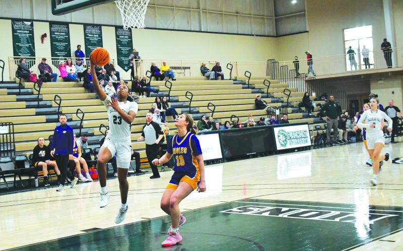 TFS senior Denika Lightbourne lays up the ball against Athens Christian on Friday, Feb. 17. Lightbourne put up 26 points.