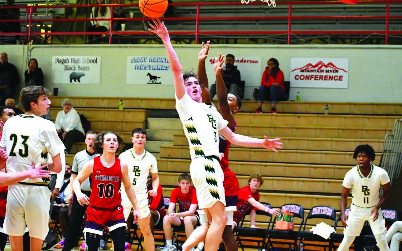 Luke Morey/The Clayton Tribune. RGNS senior Theo Antinori puts up two of his 13 points he scored in the first uarter. Antinori and the Eagles fell 49-45 to Providence Day in the state quarterfinals.