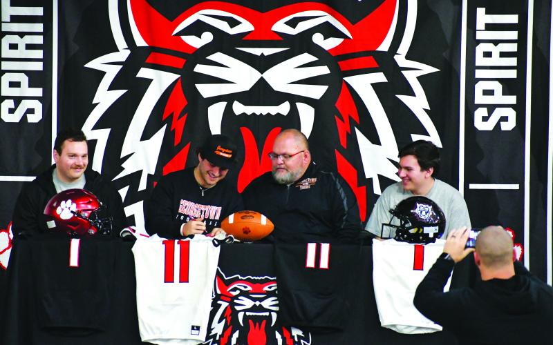 Luke Morey/The Clayton Tribune. Joined by his family, Nicholas Baloga signed his collegiate letter on Wednesday, Feb. 1. From left to right: Zac, Nicholas, Gregory, and Jacob Baloga.