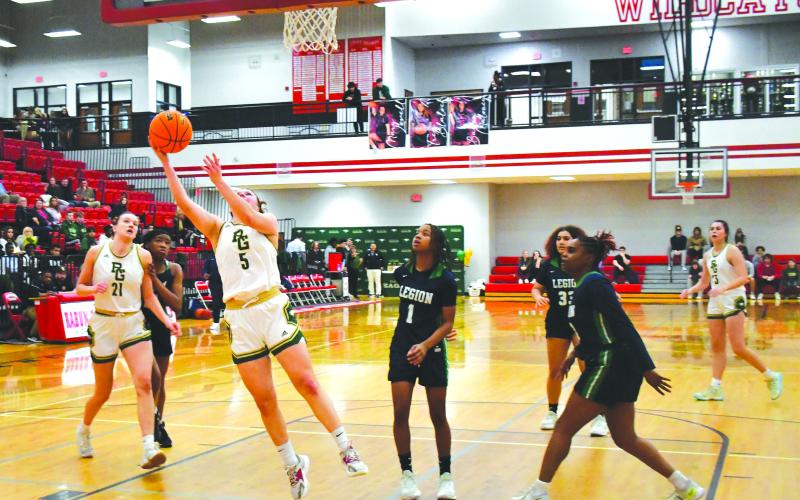 Luke Morey/The Clayton Tribune. RGNS junior Kornelia Ignerska hits a layup in the second half against Legion Collegiate Academy on Saturday, Feb. 11. Ignerska ended with eight points as the Lady Eagles won 61-47 in the final game of the season.