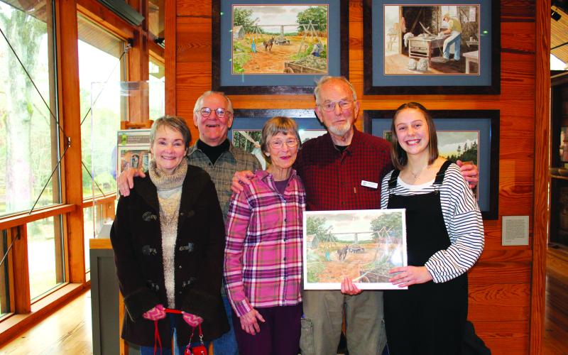Submitted. Trustees with the Folk Pottery Museum of Northeast Georgia present Rabun Gap-Nacoochee School sophomore student Kathryn Stribling with a set of John Kollock prints to thank her for her article about regional folk pottery, highlighting women in folk pottery, which was featured in Foxfire: Summer 2022. Pictured are Cheri Luhn, left, John Luhn, Jeanie Daves, Walter Daves and Stribling.