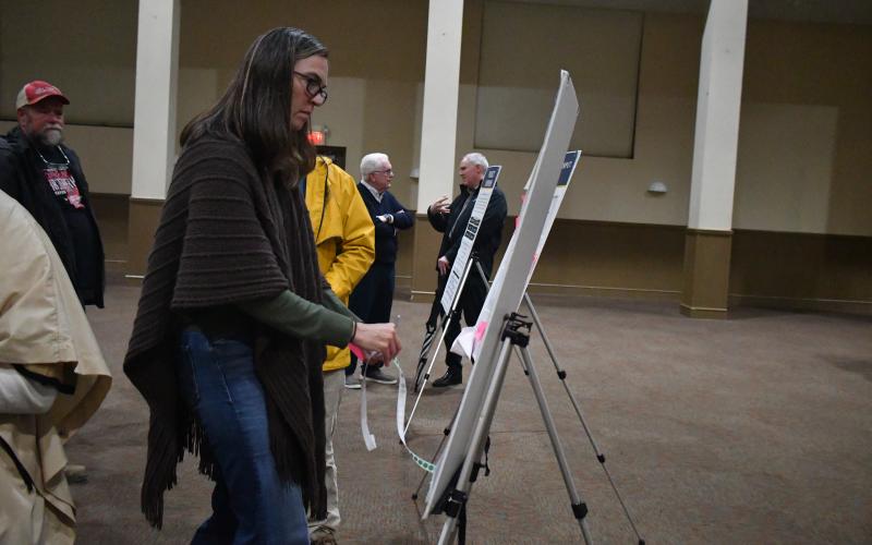 Megan Broome/The Clayton Tribune. Local real estate agent Sarah Gillespie provides her opinion on what should happen with zoning in Rabun County by interacting at the open house Feb. 9. The open house was organized to gauge input on the county’s zoning ordinances, specifically regarding non-traditional developments.