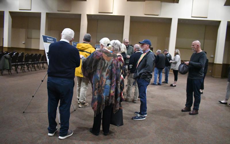 Megan Broome/The Clayton Tribune. Crowds of people analyze bulletin boards set up during an open house at the Rabun County Civic Center Feb. 9 to discuss and make their opinions known about how they want to see the future of zoning in Rabun County. The open house was organized to gauge input on the county’s zoning ordinances, specifically regarding non-traditional developments.