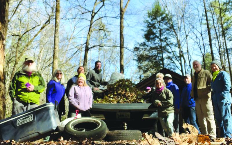 Submitted photo. Georgia ForestWatch Board members volunteer to remove 300 pounds of invasive plants and trash before many spring wildflowers emerge at the Warwoman Dell recreation area just outside Clayton.