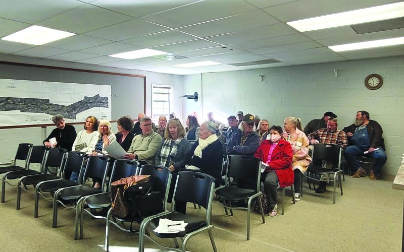 Megan Broome/The Clayton Tribune. Dozens of people attend the Mountain City council meeting Tuesday night to ask questions and discuss the recent sudden closure of the Mountain City U.S. Post Office.