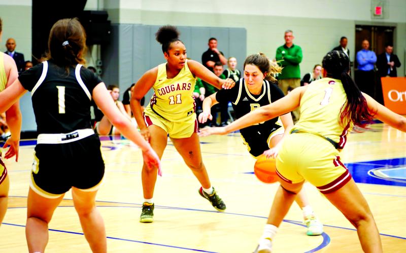 RGNS Athletics. Rabun Gap senior Tuana Coskun drives into the paint against Cannon School on Saturday, Feb. 25. Coskun led the team in scoring throughout the year, signing with Robert Morris University last week to play collegiately. Coskun ended with nine points in the title tilt, her final game for Rabun Gap.