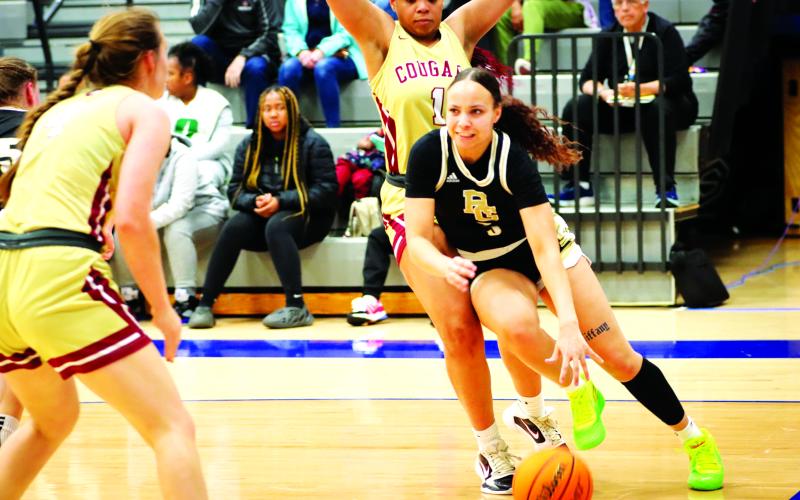 RGNS Athletics. Rabun Gap senior Mia Wilson drives against Cannon School on Saturday, Feb. 25. Wilson put up 16 points to help the Lady Eagles win their second straight state championship.