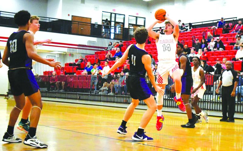 Luke Morey/The Clayton Tribune. Junior Cooper Welch goes up for a shot early in the third quarter against King’s Ridge. Welch was the sole returning starter from last year’s team that also made it to the Sweet Sixteen. Welch led the team in scoring this year, but rolled his ankle in the middle of the third quarter against King’s Ridge, finishing with six points in the final game of his junior season.