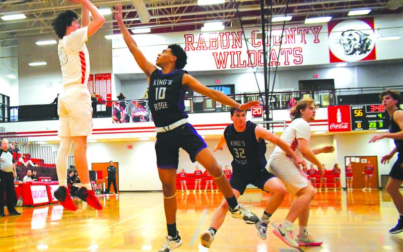 Luke Morey/The Clayton Tribune. RCHS senior Jayton Henry hits two of his four points in his final game in a Wildcat uniform. Henry was a staple in the starting lineup this season, putting up nearly 12 points per game on 48 percent from the field.
