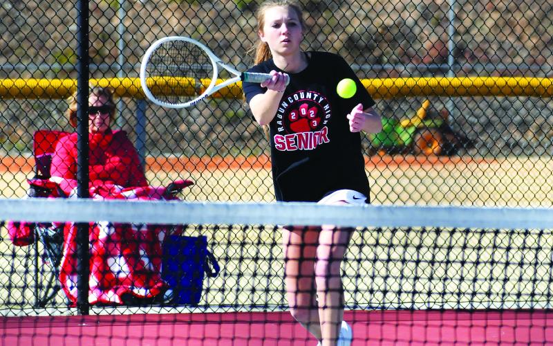 Luke Morey/The Clayton Tribune. Rabun County senior Natalie Watson returns a hit against BASA on Tuesday, March 21. Watson was one of the four seniors honored for senior day.