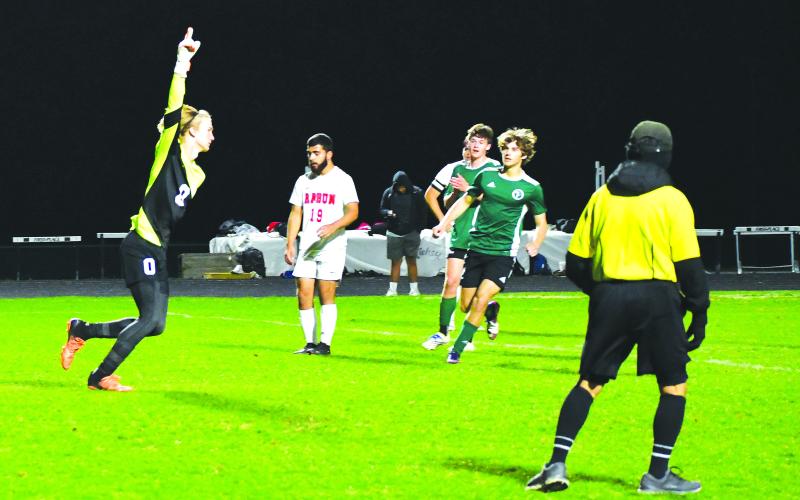 Luke Morey/The Clayton Tribune. Tallulah Falls goalkeeper sophomore  Kelton Reynolds celebrates his penalty kick goal against Rabun County on Tuesday, March 28. Reynolds and the 13-0 Indians won region for the first time in program history.