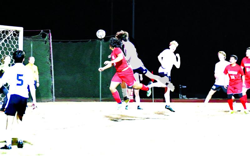 Luke Morey/The Clayton Tribune. Rabun County’s Luis Lopez heads in a goal against Tallulah Falls on Tuesday, March 7. Lopez’s goal was the first goal Tallulah Falls has allowed in their eight games, with the Wildcats falling to the Indians 2-1.
