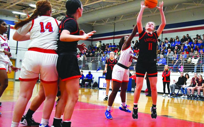 Luke Morey/The Clayton Tribune. RCHS junior Lucy Hood hits a layup in the third quarter in the Sweet Sixteen  against Oglethorpe County. Hood ended with 12 points and six rebounds in the loss.