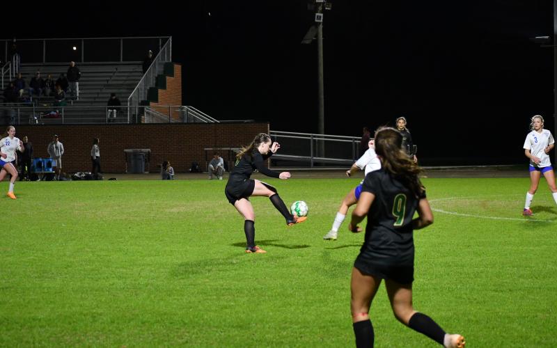 Luke Morey/The Clayton Tribune. Rabun Gap junior Gracie Scott gets control of the ball before she scores against Highlands on Wednesday, March 8. As the defensive midfielder, Scott, as one of the captains, has helped lead the Lady Eagles to an undefeated start to the season.