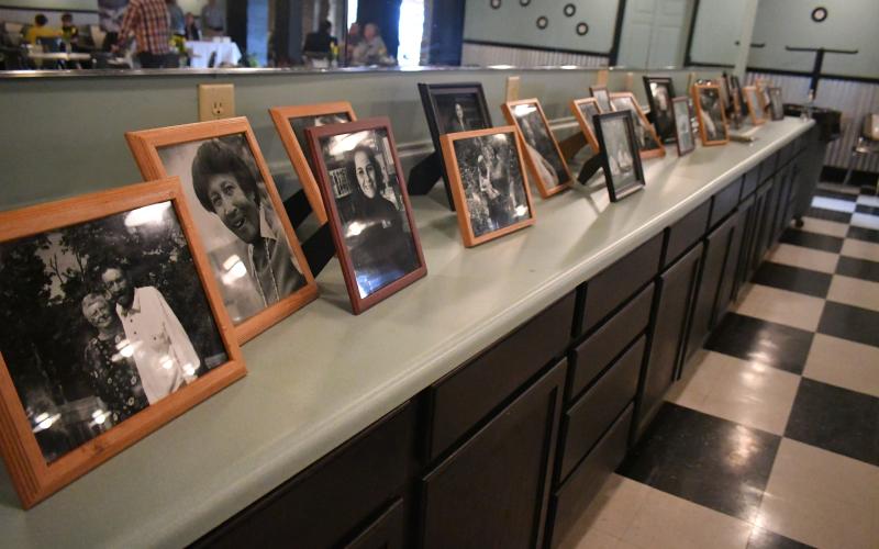 Megan Broome/The Clayton Tribune. Pictures of women throughout history were displayed among decorations at Foxfire’s book launch event for the newly released “The Foxfire Book of Appalachian Women: Stories of Landscape and Community in the Mountain South” held in the Rabun County Civic Center Diner Saturday, March 11. The book was written and edited by Kami Ahrens, curator and director of education for Foxfire.