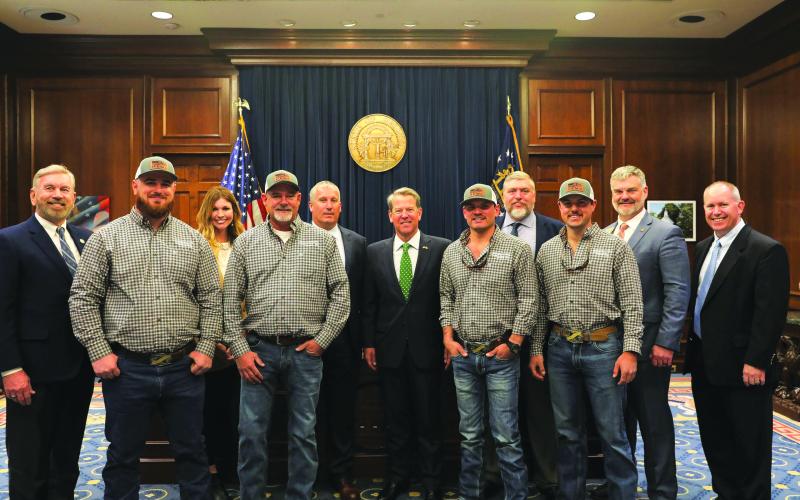 Submitted photo. Pictured (from left) are Terry Rogers; Robert Morris, team member; Mary Beth Horton, Community Relations Ambassador; Chris Chapman, team coach; Bryan Ferguson, HEMC President &amp; CEO; Gov. Brian Kemp; Dillon Welborn, team member; Josh Allen, HEMC V.P., Engineering &amp; Operations; Tucker Dyer, team member; Rep. Victor Anderson; and Tommy Thurmond HEMC V.P. Member &amp; Community Relations.