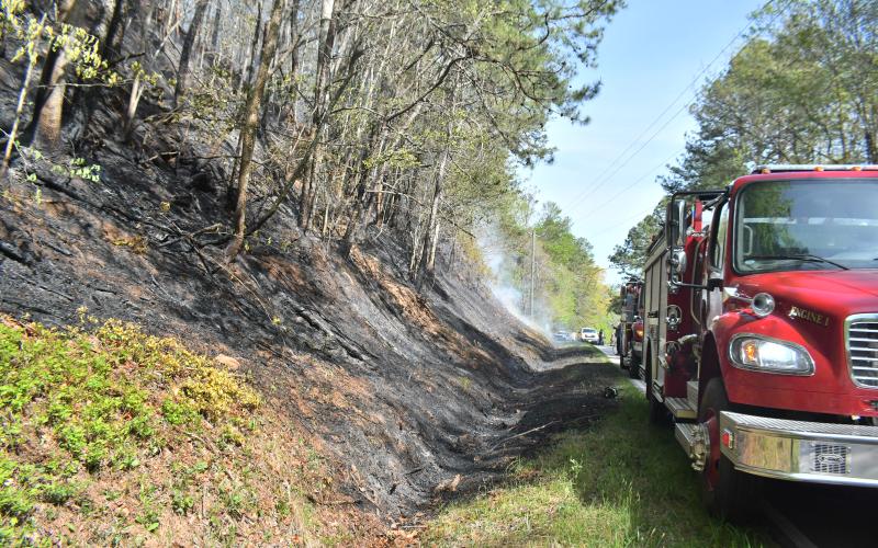 Megan Broome/The Clayton Tribune. Rabun County Fire Services responds to a wildfire at Bettys Creek and Colony Road in Dillard.