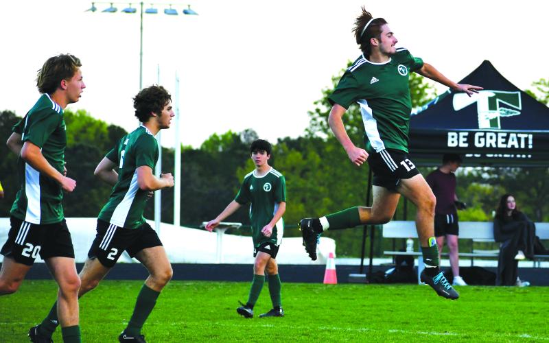 Luke Morey/The Clayton Tribune. TFS sophomore Landon Hall celebrates his goal against Darlington on Wednesday, April 12.