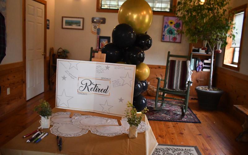Megan Broome/The Clayton Tribune. Dozens of people attended a retirement party for Dr. Guy Gober at Tiger Clinic Friday, March 31. Tiger Clinic was decorated with balloons and banners congratulating Gober on his retirement.