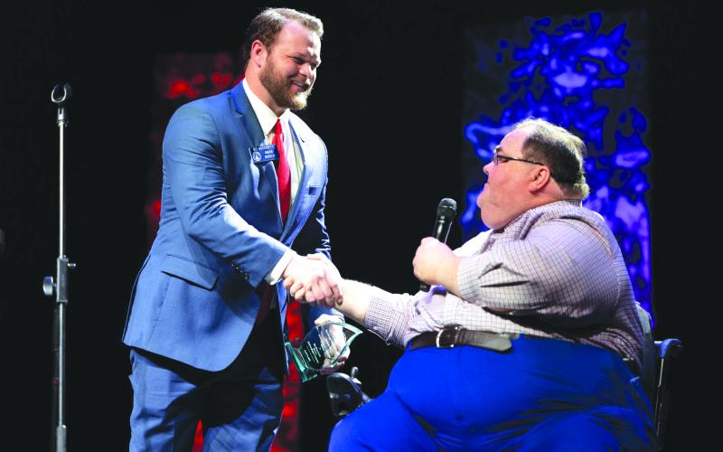 Submitted photo. Sen Bo Hatchett, representing Georgia’s 50th Senate District, shakes hands with Ed Henderson, secretary for the Rabun County Republican Party, after being presented with the “Legislator of the Year” award April 14.