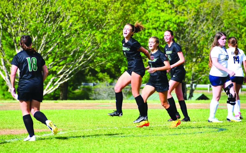 Luke Morey/The Clayton Tribune. Lady Eagle junior Georgia Mattis celebrates her goal against Asheville School on Friday, April 28.