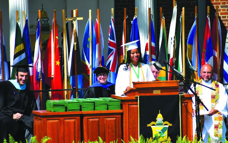 Luke Morey/The Clayton Tribune. Rabun Gap senior Sharra-Alexa Rolle was the senior speaker for the Class of 2023. Behind Rolle, from left, are Head of School Jeff Miles; Head of Upper School Erika Farr; Rev. Jeffry Reynolds and Rev. Ozu Mejia.