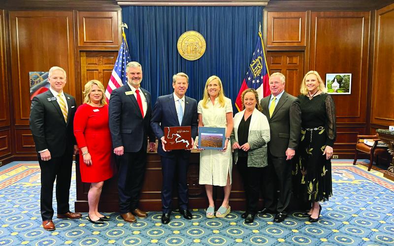 Submitted photo.  Pictured are State Senate President Pro Tem John F. Kennedy, left, Kim Anderson, District 10 State Rep. Victor Anderson; Georgia Gov. Brian Kemp; First Lady of Georgia Marty Kemp, President of Lake Rabun Association Connie Thompson; Vice President Lake Rabun Association Pat Hickey; and President of Lake Burton Civic Association Elizabeth Gill.