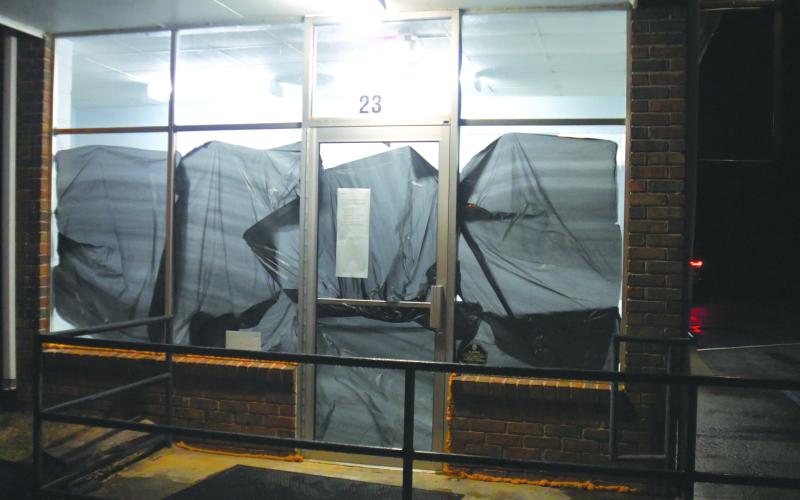 File Photo/Enoch Autry/The Clayton Tribune. Black bags were taped on the windows of the Mountain City Post Office as the site was unable to renew its lease for March. Those with Mountain City post office boxes now must travel farther for their mail.