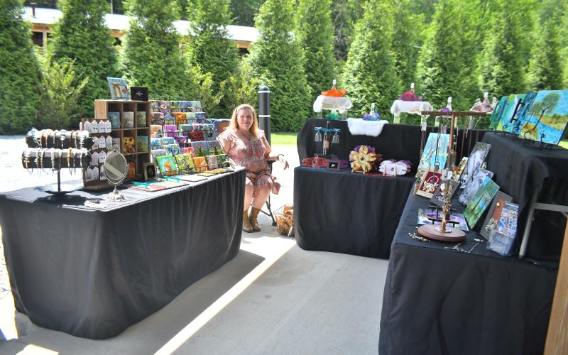 Megan Broome/The Clayton Tribune. Von Thorne Art Emporium was happy to be set up at the Of These Mountains Spring MarketPlace held in downtown Clayton last Saturday.