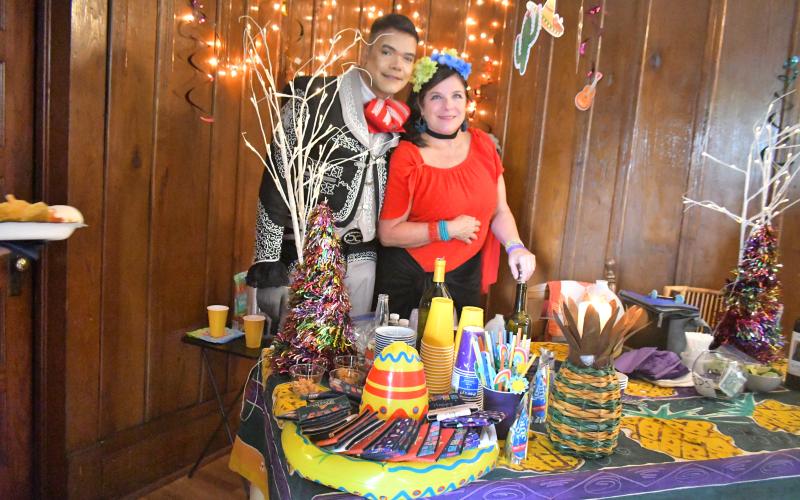 Megan Broome/The Clayton Tribune. Ishmael Santos, left, and Valerie Carpenter attend a Cinco de Mayo celebration organized by Rabun Entertainers at The Rock House Friday, May 5. Rabun Entertainers performed music in colorful garments at The Rock House in Clayton to celebrate Cinco de Mayo on Friday, May 5. The performers danced to traditional Mariachi music and sang songs in both Spanish and English. The event featured homemade tacos with all the fixings, drinks, dancing and prizes.