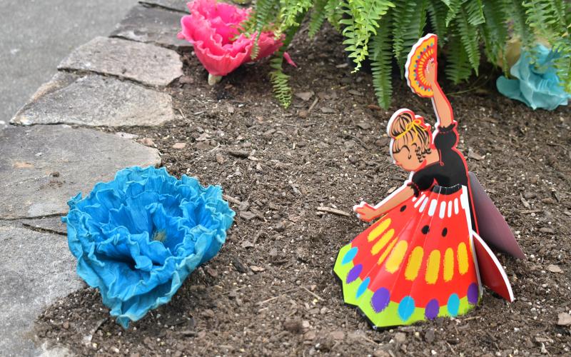 Megan Broome/The Clayton Tribune. This was one of many colorful and festive decorations at The Rock House in Clayton Friday, May 5 as Rabun Entertainers celebrated Cinco de Mayo with a community event. The performers danced to traditional Mariachi music and sang songs in both Spanish and English. The event featured homemade tacos with all the fixings, drinks, dancing and prizes with attendees celebrating with friends and family.