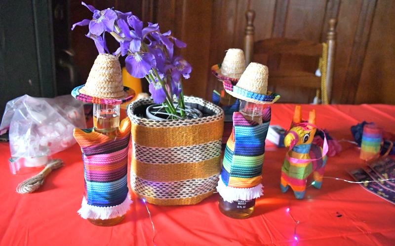 Megan Broome/The Clayton Tribune. This was one of many colorful and festive decorations at The Rock House in Clayton Friday, May 5 as Rabun Entertainers celebrated Cinco de Mayo with a community event. The performers danced to traditional Mariachi music and sang songs in both Spanish and English. The event featured homemade tacos with all the fixings, drinks, dancing and prizes with attendees celebrating with friends and family.