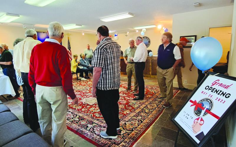 Megan Broome/The Clayton Tribune. Community members tour the newly renovated Sky Valley City Hall facility during the ribbon-cutting and grand opening event. The building will function as City Hall, Sky Valley Visitors Center, council chambers and municipal court.