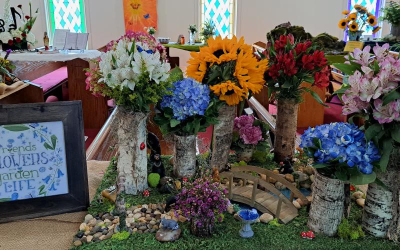Megan Broome/The Clayton Tribune. "Friends are the flowers in the garden of life" and friends gathered at St. James Episcopal Church for the 15th annual Flower and Liturgical Arts Festival.